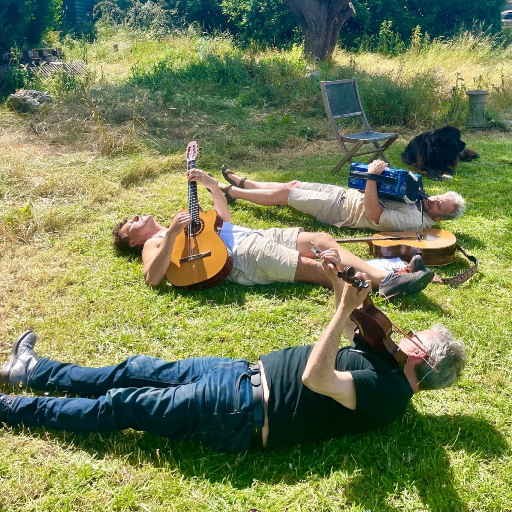  “Nick, Dick & Tom” rehearsing in the garden with Nick and Tom patiently awaiting Richard’s downbeat